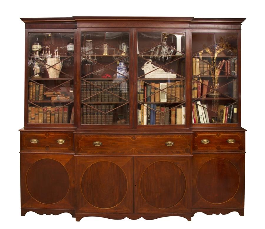 A Georgian mahogany breakfront secretaire bookcase