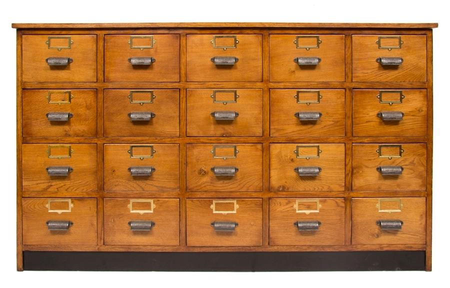 An oak vintage haberdashers bank of drawers