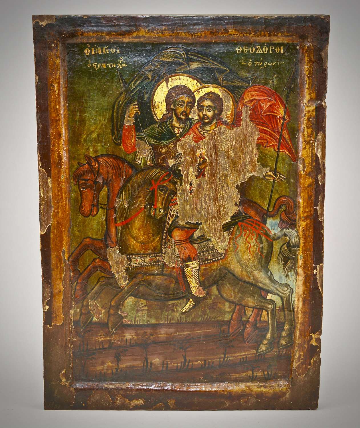 Antique Greek icon depicting Saints on horseback