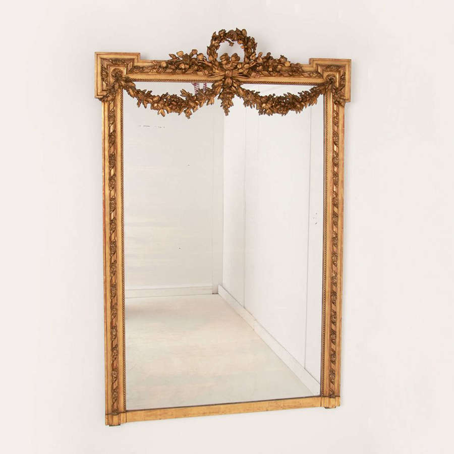 Large antique mirror with gesso crest, swags and ribbon C 1880
