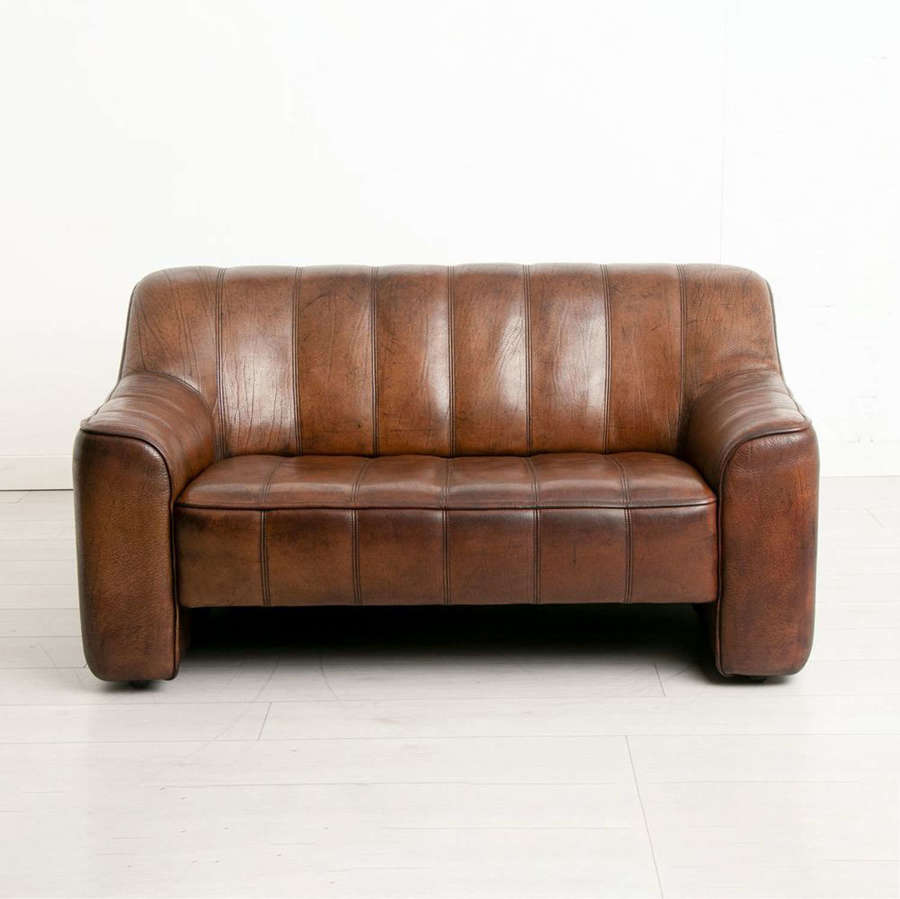 A vintage two-seater model DS44 sofa by De Sede