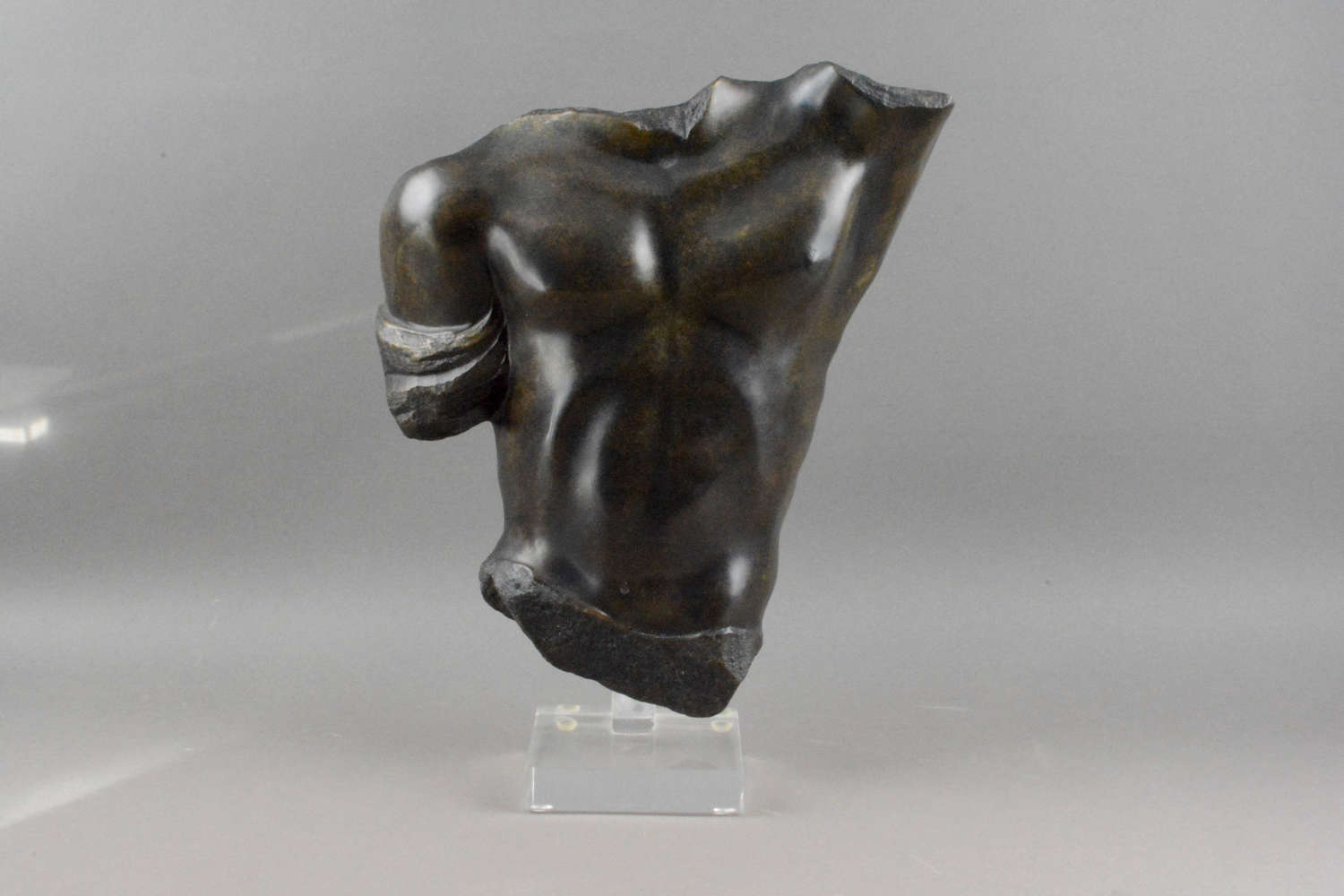 A superb vintage male torso sculpture. Cast in solid bronze